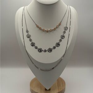 3 Strand Necklace Featuring Beads, Metal Flowers and Metal Chain.